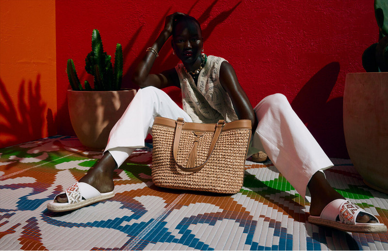 Abeny Nhial featured in  the Mimco Local Colour  advertisement for Resort 2023