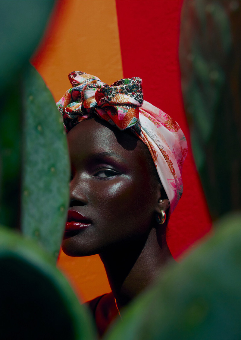 Abeny Nhial featured in  the Mimco Local Colour  advertisement for Resort 2023