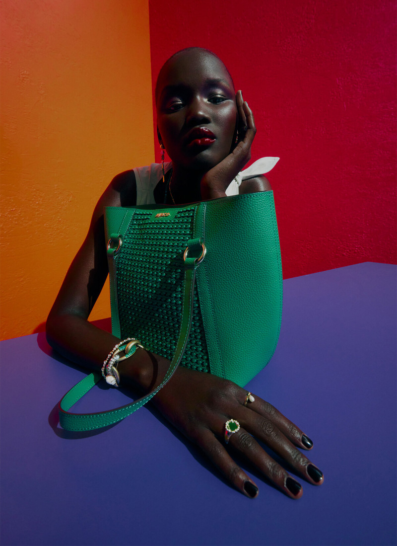 Abeny Nhial featured in  the Mimco Local Colour  advertisement for Resort 2023