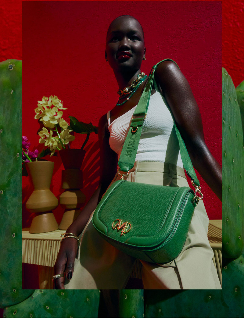 Abeny Nhial featured in  the Mimco Local Colour  advertisement for Resort 2023