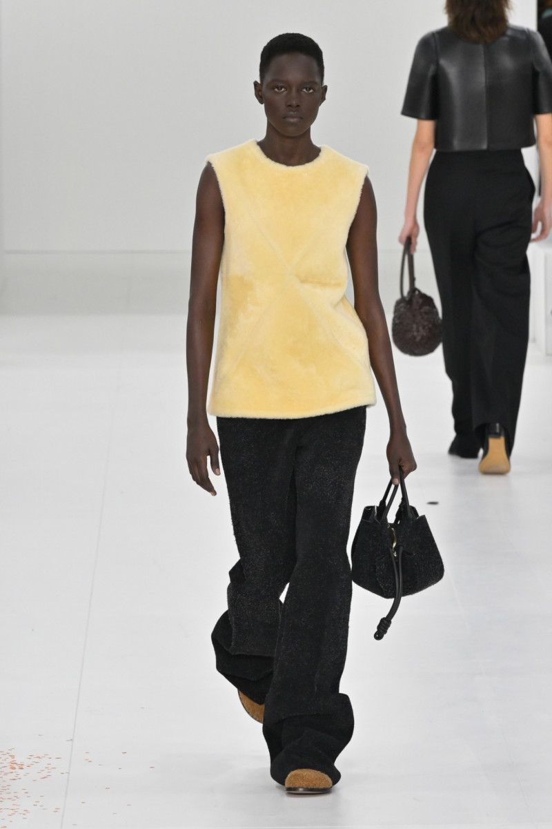 Alaato Jazyper featured in  the Loewe fashion show for Autumn/Winter 2023