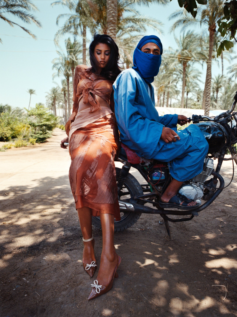 Imaan Hammam featured in  the Amina Muaddi advertisement for Spring/Summer 2022