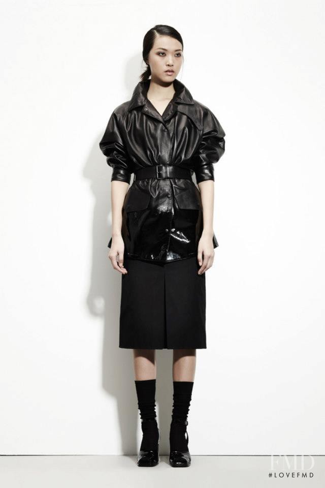 Tian Yi featured in  the Bottega Veneta lookbook for Pre-Fall 2013