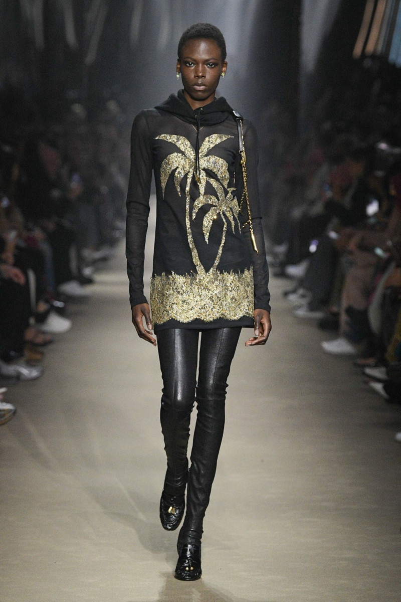 Agel Akol featured in  the Palm Angels fashion show for Autumn/Winter 2023