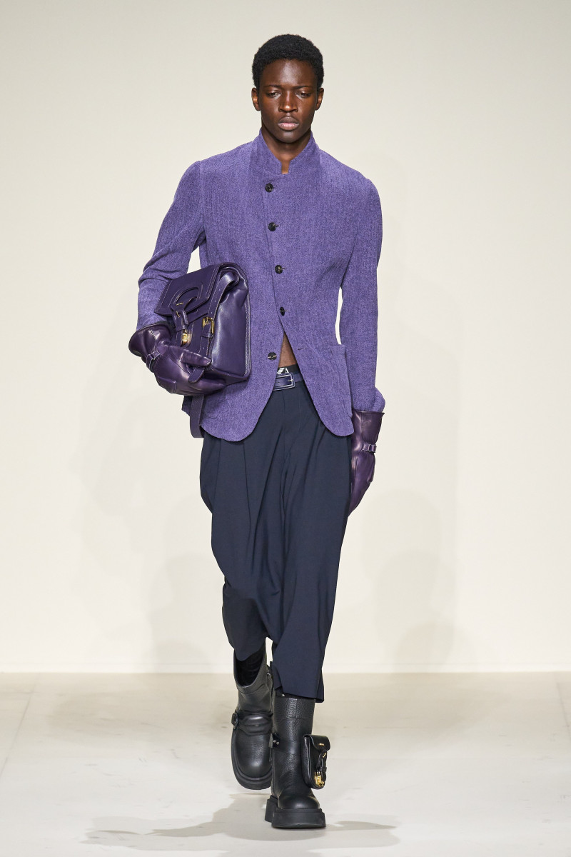 Limamu Mbaye featured in  the Emporio Armani fashion show for Autumn/Winter 2023