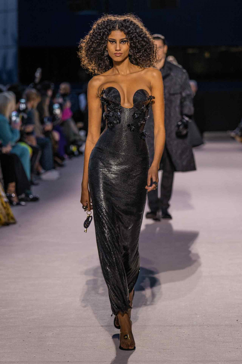 Imaan Hammam featured in  the Versace fashion show for Autumn/Winter 2023