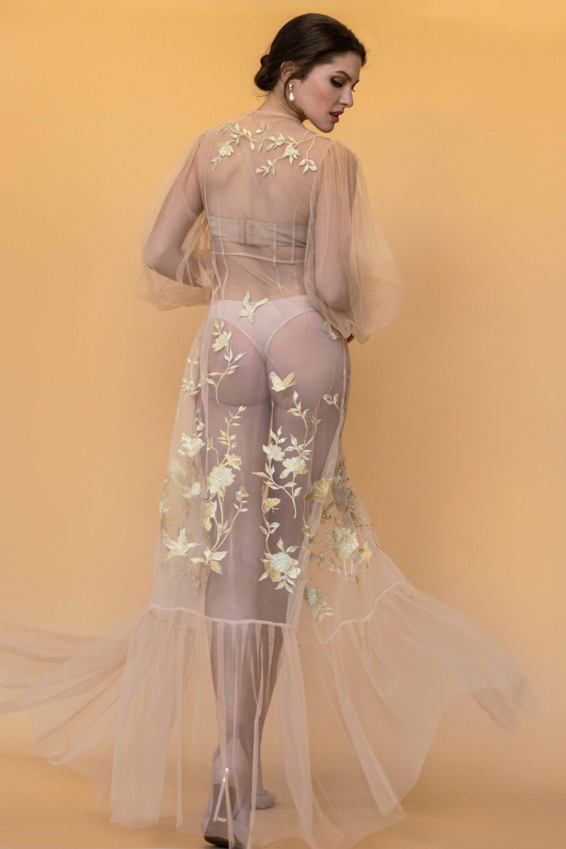 Angelina Pirtskhalava featured in  the Apilat advertisement for Spring/Summer 2023