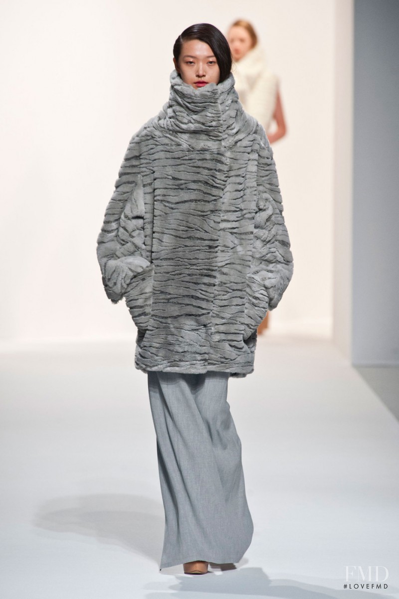 Tian Yi featured in  the Hussein Chalayan fashion show for Autumn/Winter 2014