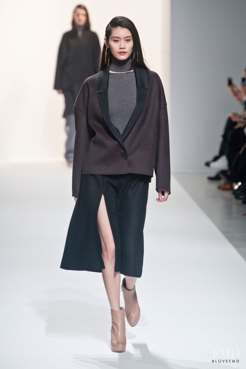 Ming Xi featured in  the Hussein Chalayan fashion show for Autumn/Winter 2014