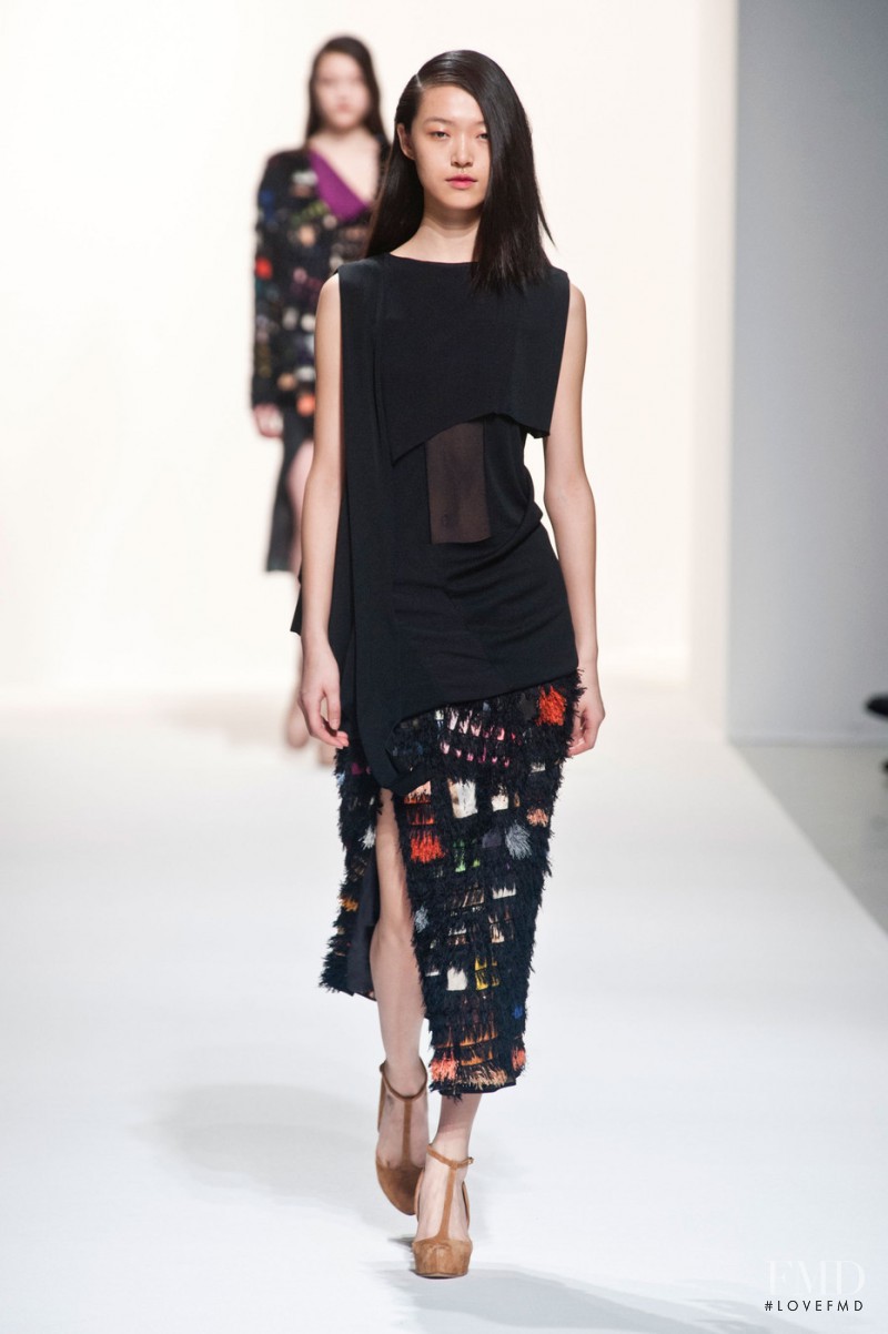 Tian Yi featured in  the Hussein Chalayan fashion show for Autumn/Winter 2014