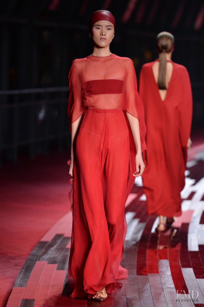 Hui Hui Ma featured in  the Valentino Red Collection fashion show for Spring/Summer 2013