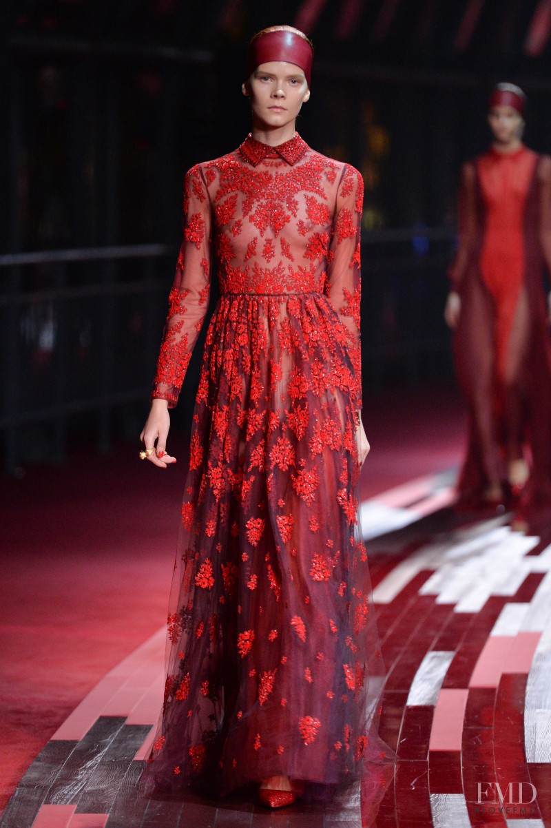 Irina Kravchenko featured in  the Valentino Red Collection fashion show for Spring/Summer 2013