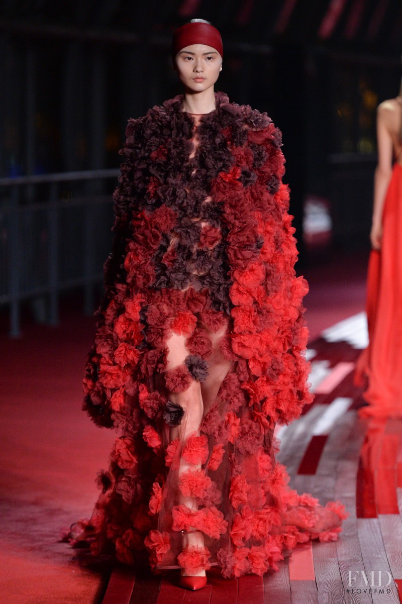 Cong He featured in  the Valentino Red Collection fashion show for Spring/Summer 2013