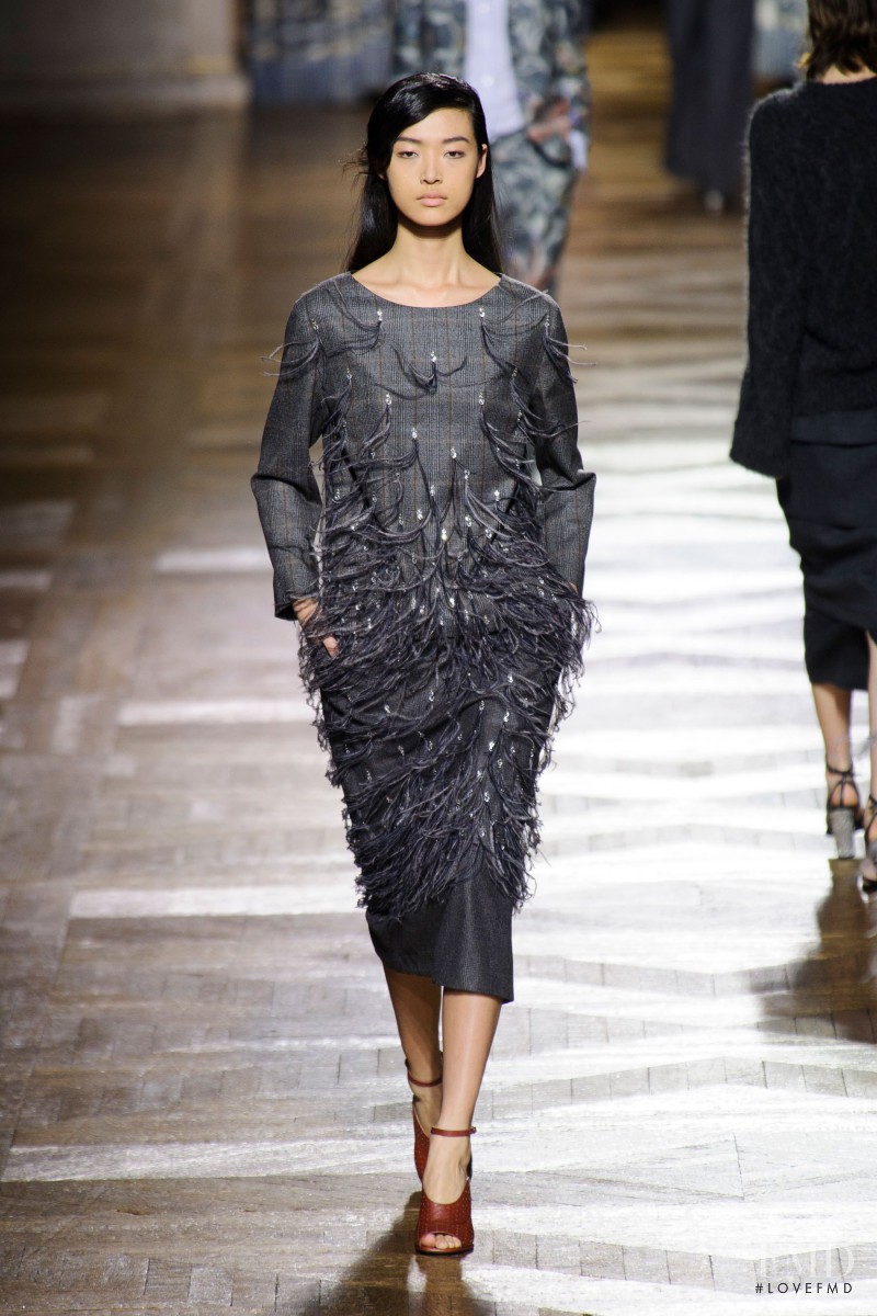 Tian Yi featured in  the Dries van Noten fashion show for Autumn/Winter 2013
