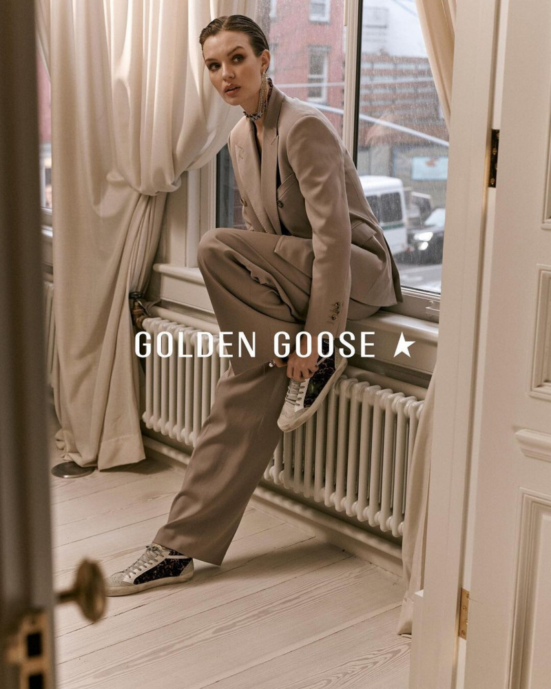 Josephine Skriver featured in  the Golden Goose Deluxe Brand advertisement for Spring/Summer 2023