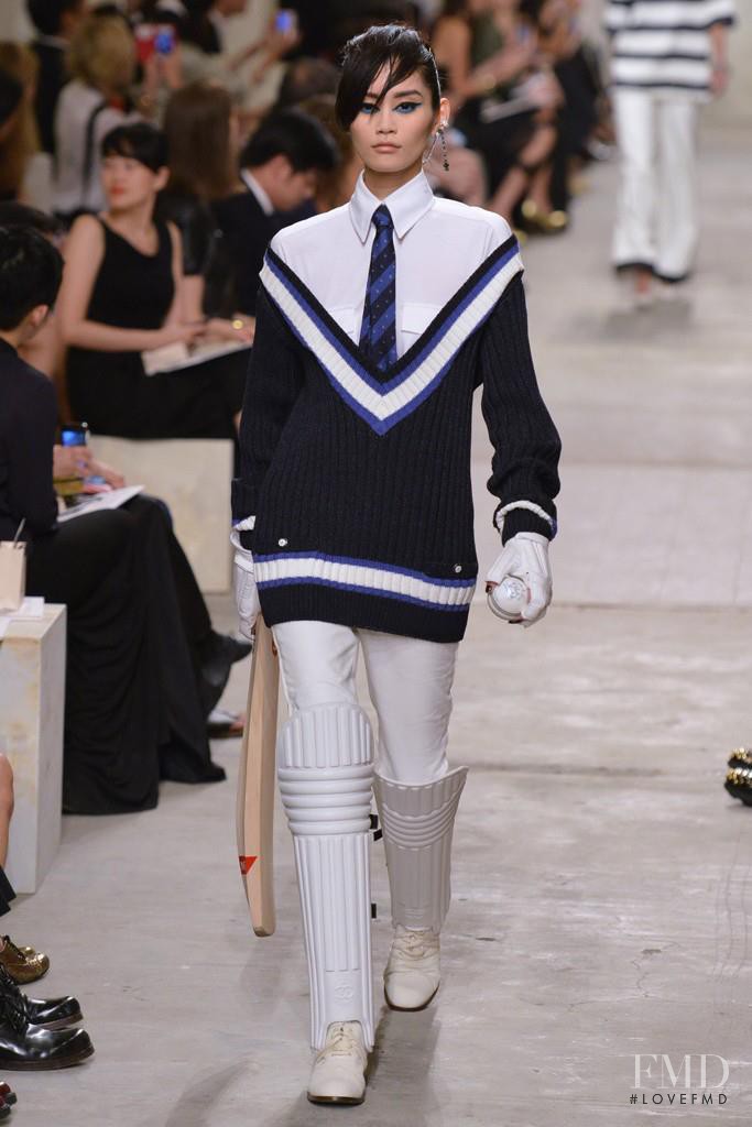 Ming Xi featured in  the Chanel fashion show for Cruise 2014