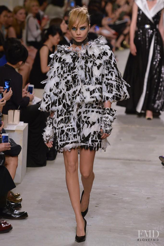 Cara Delevingne featured in  the Chanel fashion show for Cruise 2014