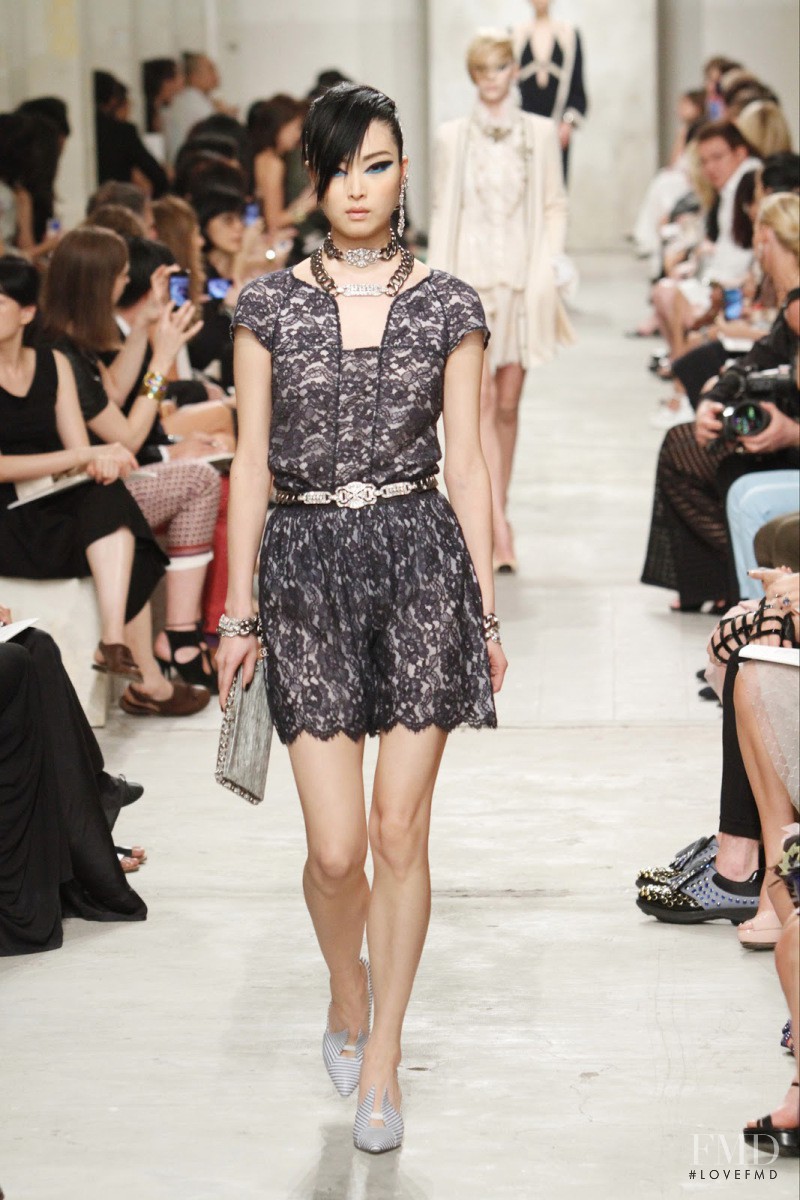 Sung Hee Kim featured in  the Chanel fashion show for Cruise 2014