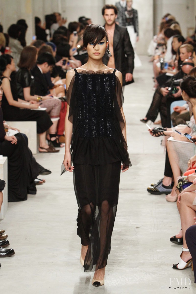 Shu Pei featured in  the Chanel fashion show for Cruise 2014