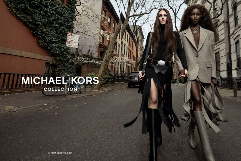 Anok Yai featured in  the Michael Kors Collection advertisement for Autumn/Winter 2023