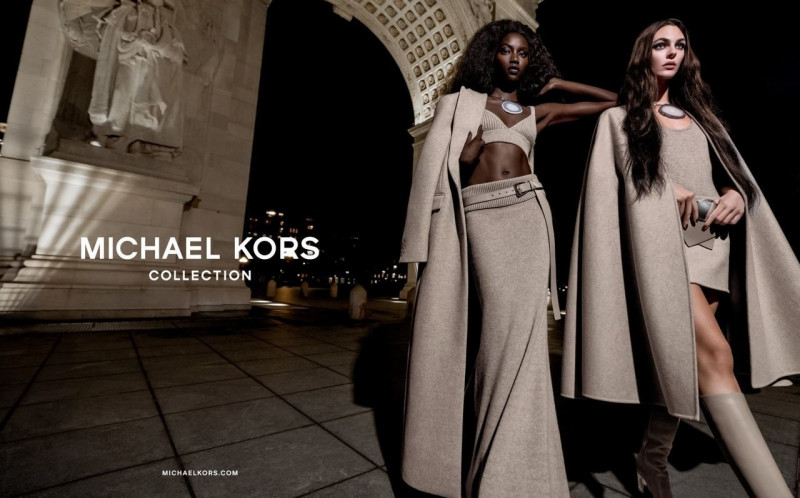 Anok Yai featured in  the Michael Kors Collection advertisement for Autumn/Winter 2023