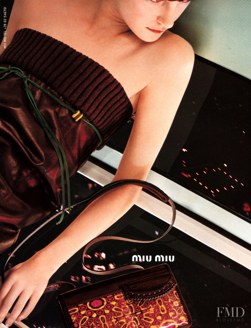 Mia Hessner-Sovensky featured in  the Miu Miu advertisement for Autumn/Winter 1999