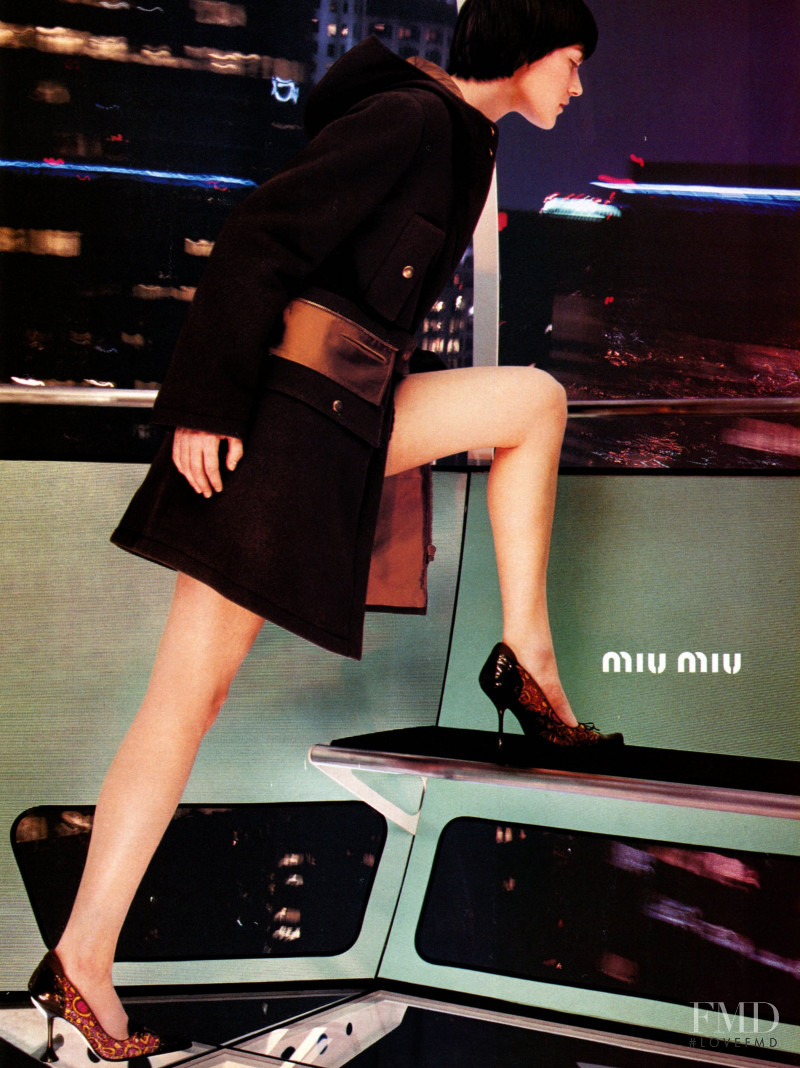 Mia Hessner-Sovensky featured in  the Miu Miu advertisement for Autumn/Winter 1999