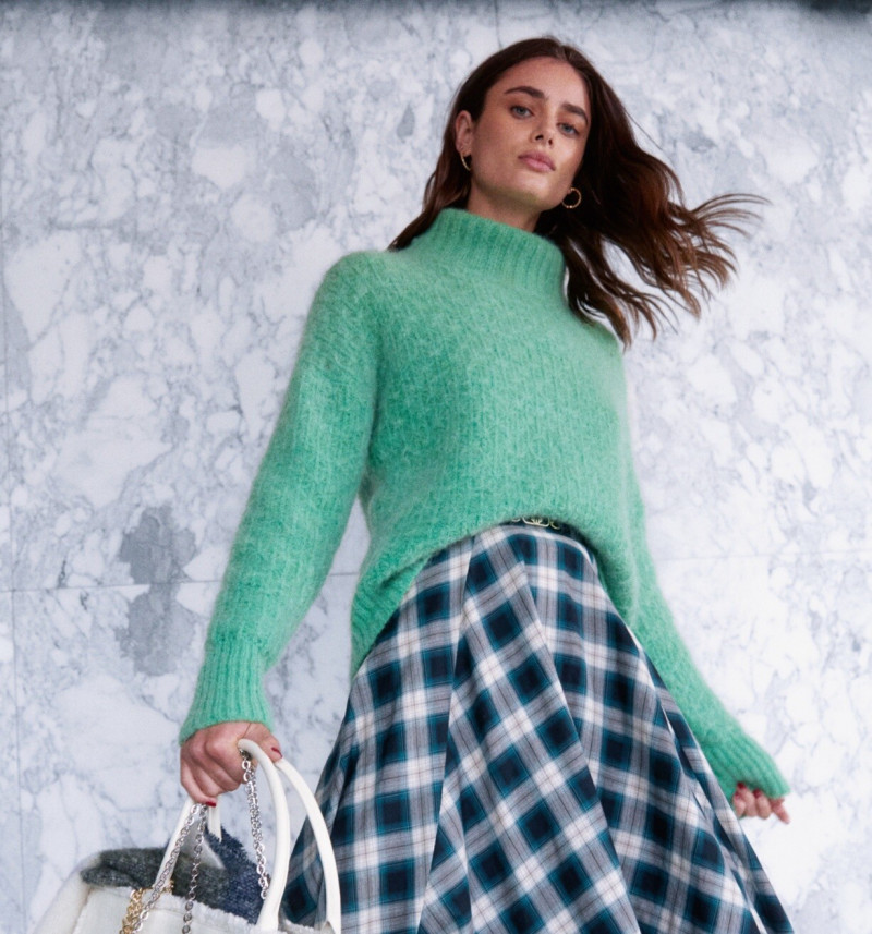 Taylor Hill featured in  the Maje advertisement for Winter 2022