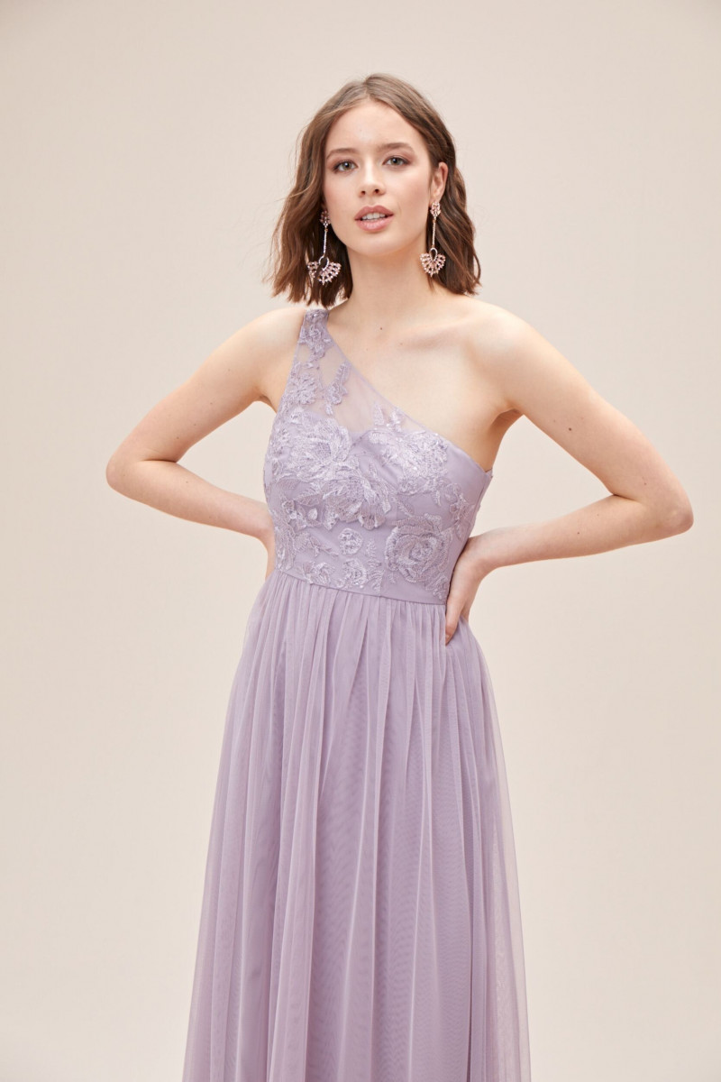 Tess Van de Bleek featured in  the Oleg Cassini catalogue for Autumn/Winter 2020