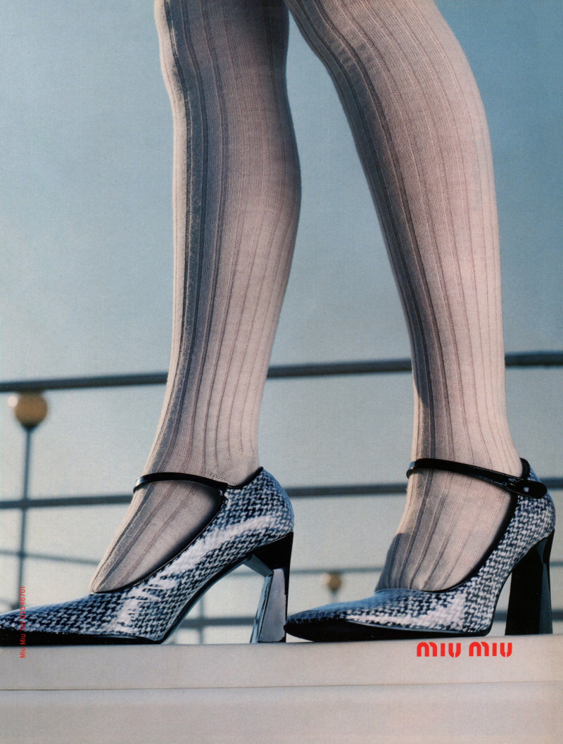 Sara Daykin featured in  the Miu Miu advertisement for Autumn/Winter 1998