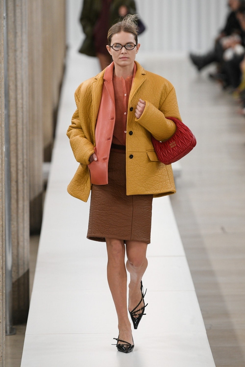 Anna Ewers featured in  the Miu Miu fashion show for Autumn/Winter 2023