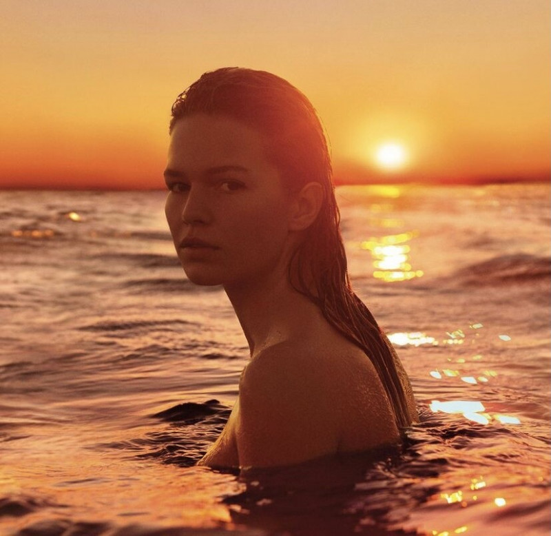 Anna Ewers featured in  the Jil Sander Parfums Sun advertisement for Summer 2022