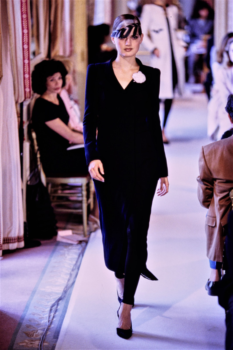 Guinevere van Seenus featured in  the Chanel Haute Couture fashion show for Autumn/Winter 1996