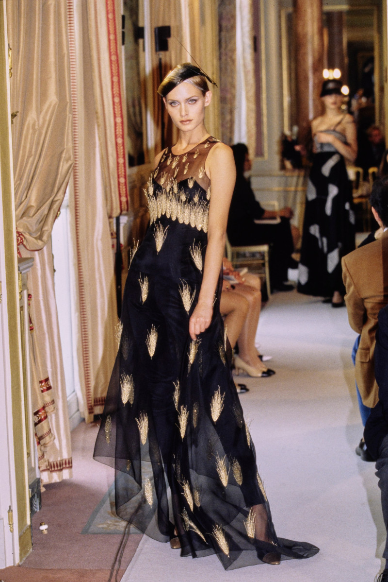 Amber Valletta featured in  the Chanel Haute Couture fashion show for Autumn/Winter 1996