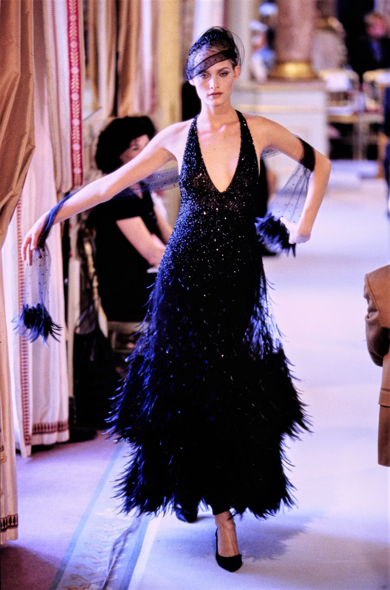 Amber Valletta featured in  the Chanel Haute Couture fashion show for Autumn/Winter 1996