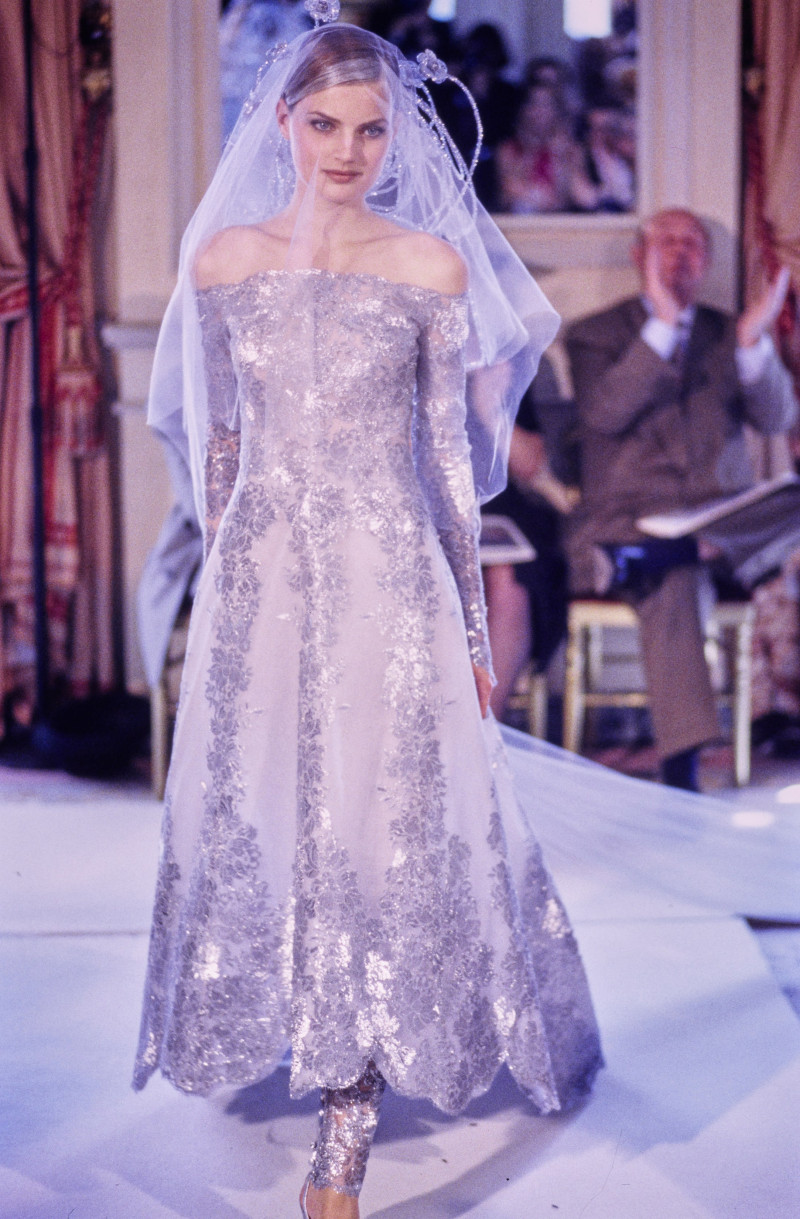 Guinevere van Seenus featured in  the Chanel Haute Couture fashion show for Autumn/Winter 1996