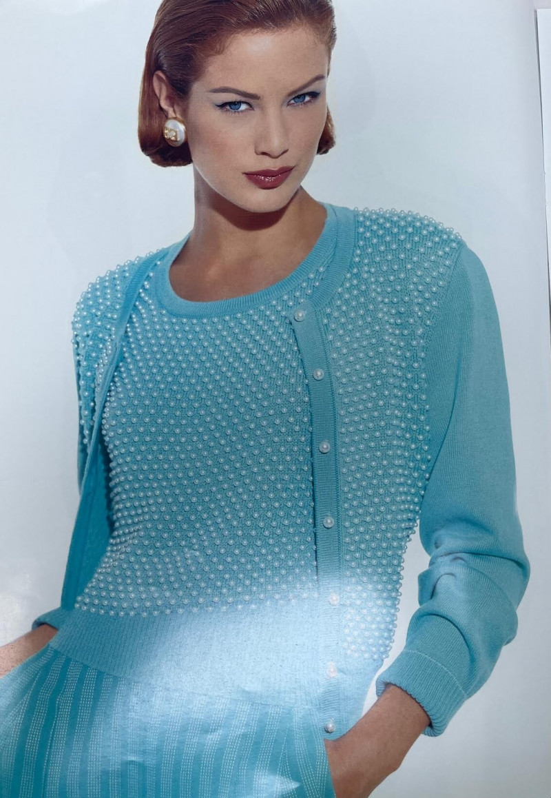 Carolyn Murphy featured in  the Escada advertisement for Spring/Summer 1996