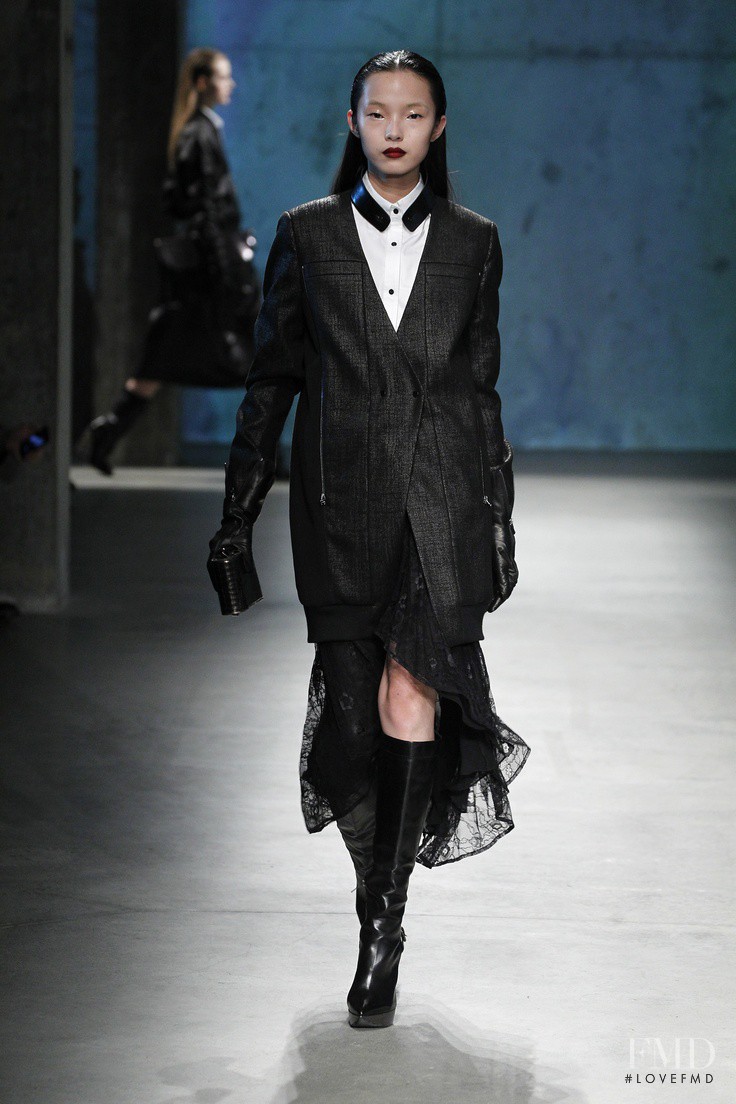 Xiao Wen Ju featured in  the Kenneth Cole fashion show for Autumn/Winter 2013