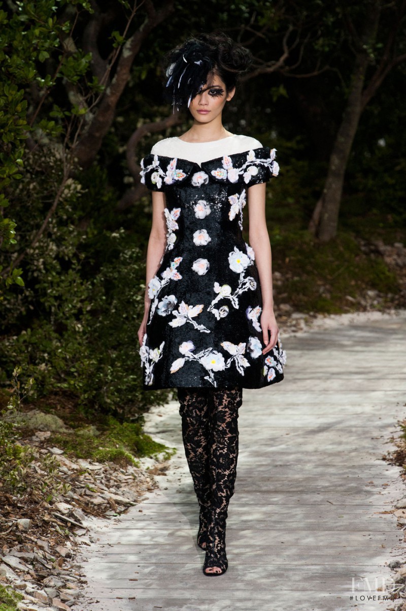 Ming Xi featured in  the Chanel Haute Couture fashion show for Spring/Summer 2013
