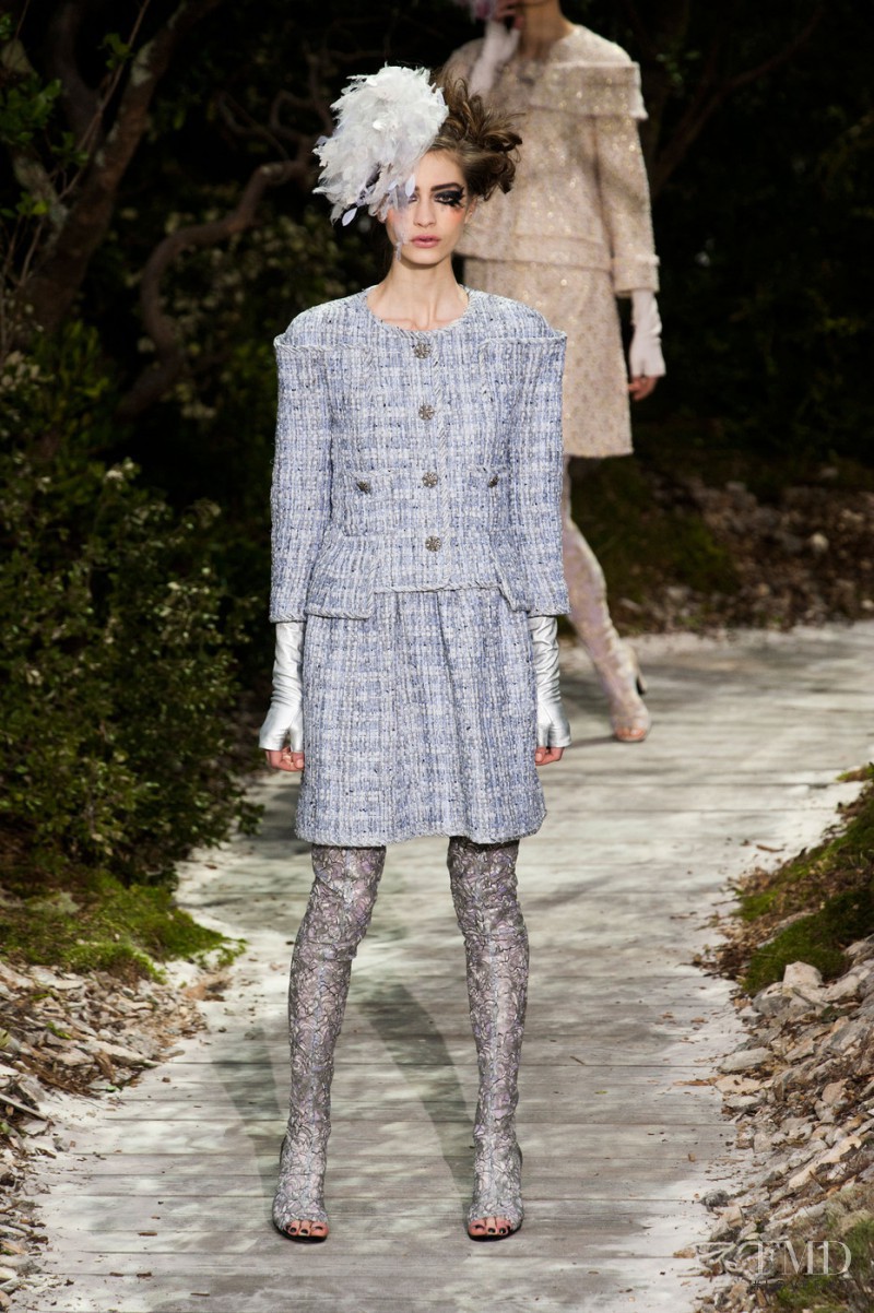 Marine Deleeuw featured in  the Chanel Haute Couture fashion show for Spring/Summer 2013
