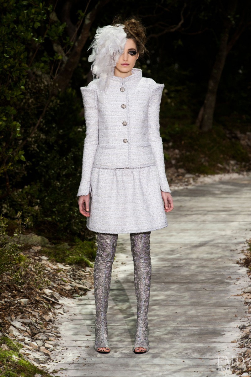 Oxana Bondarenko featured in  the Chanel Haute Couture fashion show for Spring/Summer 2013