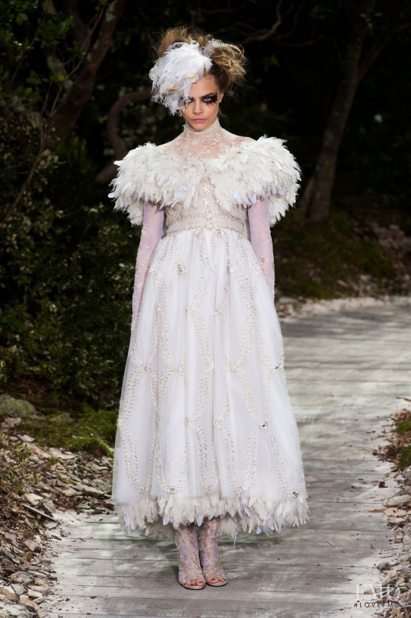 Cara Delevingne featured in  the Chanel Haute Couture fashion show for Spring/Summer 2013