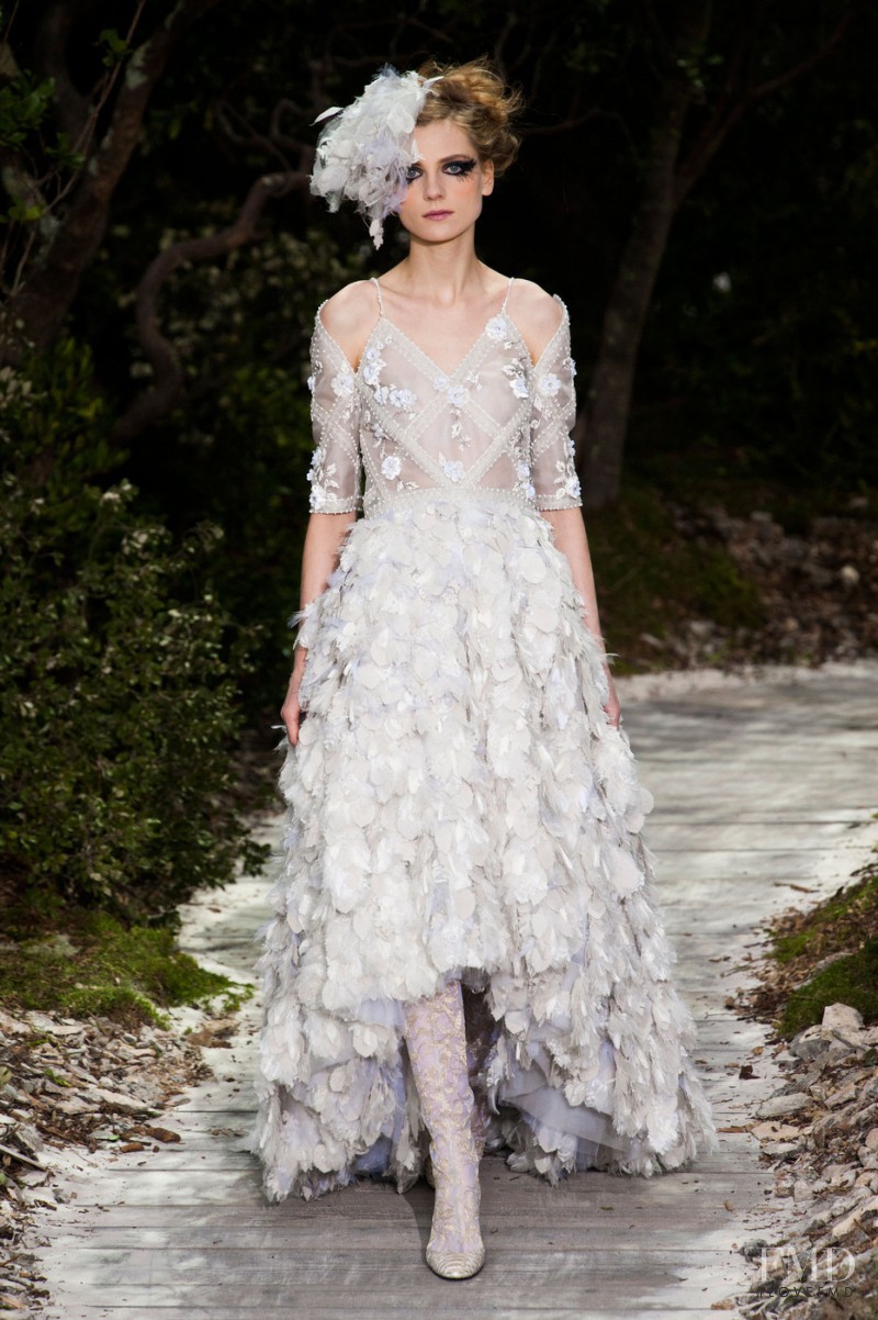 Maria Loks featured in  the Chanel Haute Couture fashion show for Spring/Summer 2013