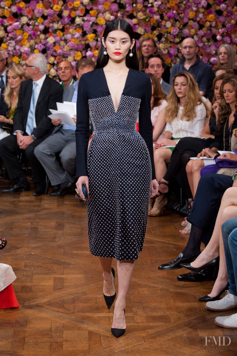 Ming Xi featured in  the Christian Dior Haute Couture fashion show for Autumn/Winter 2012