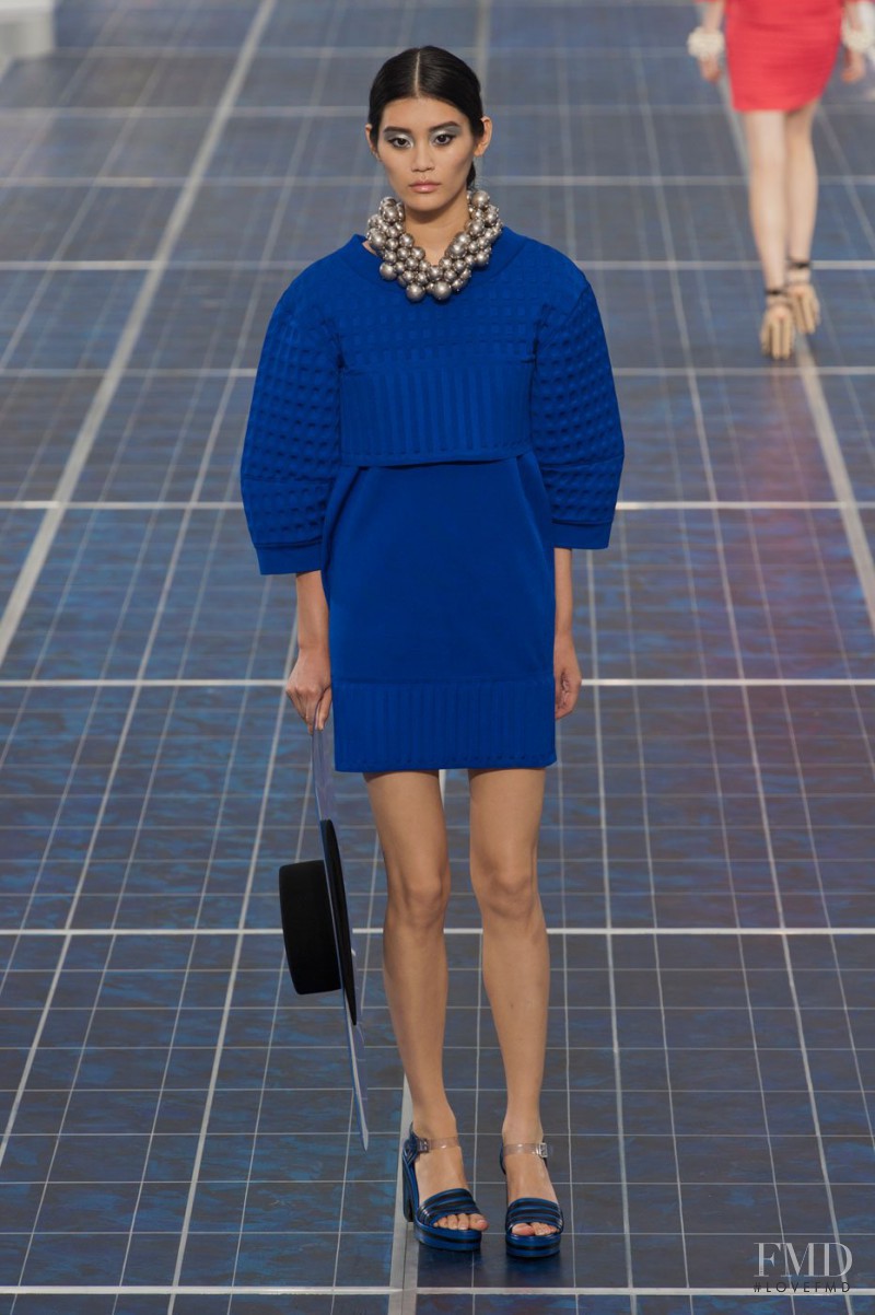 Ming Xi featured in  the Chanel fashion show for Spring/Summer 2013