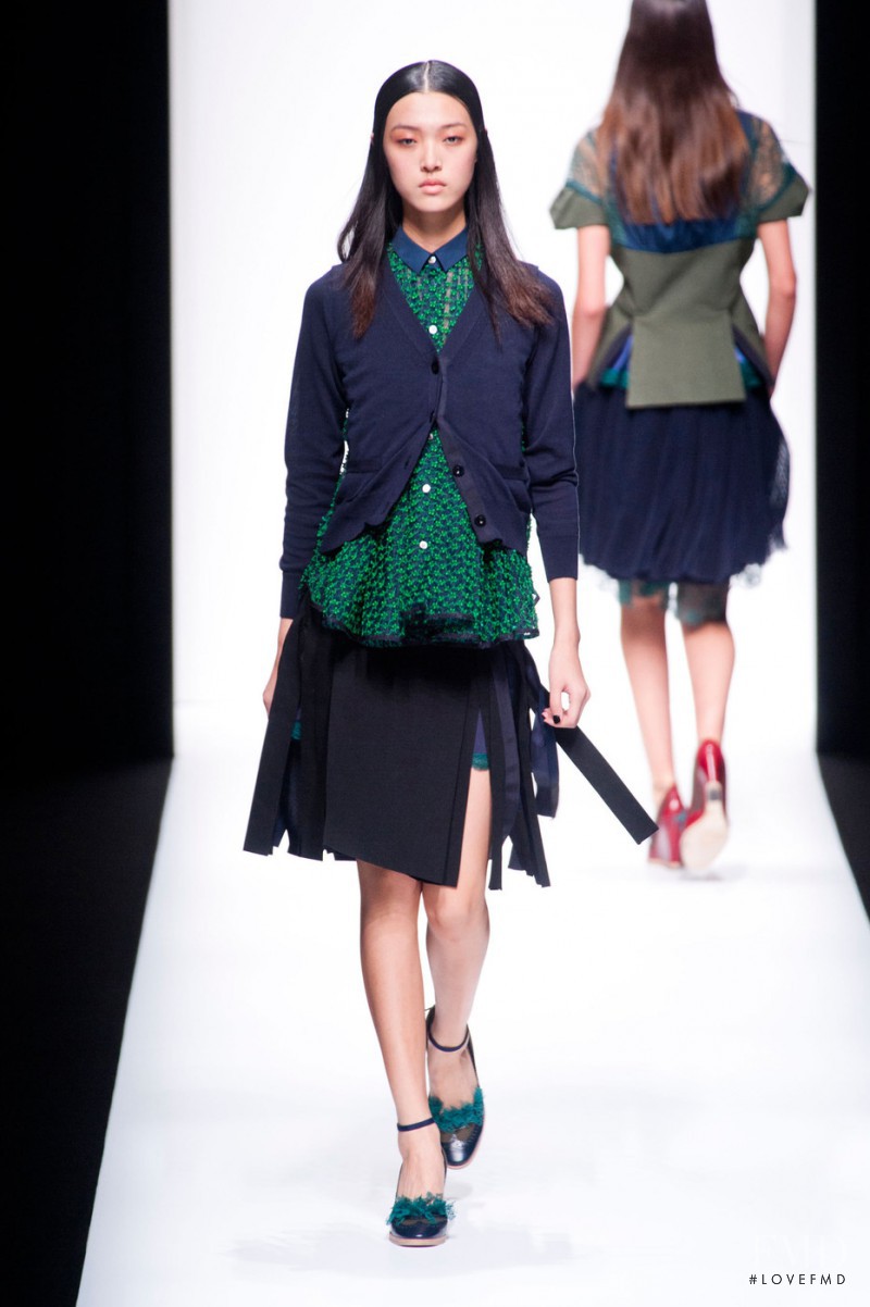 Tian Yi featured in  the Sacai fashion show for Spring/Summer 2013