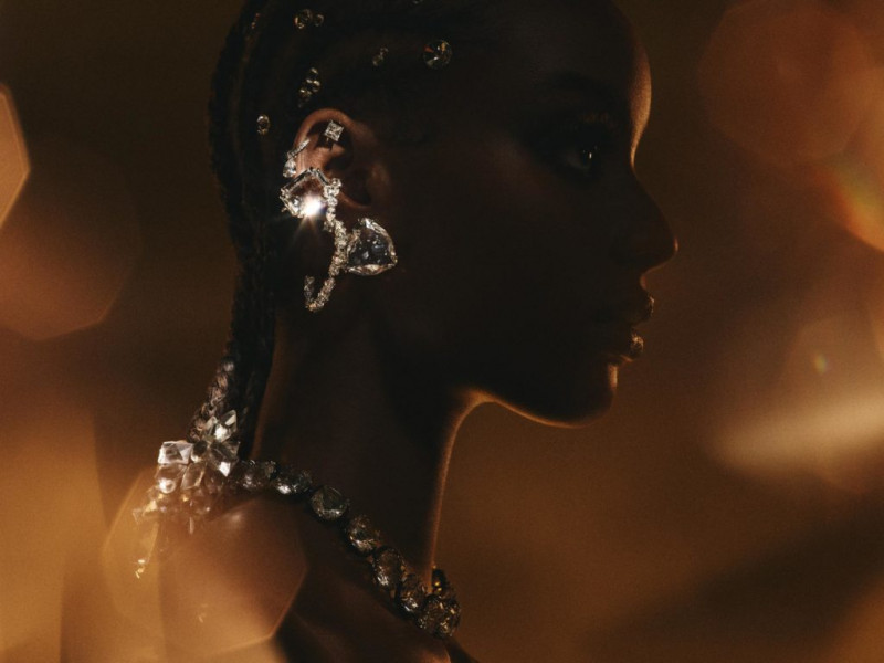 Adwoa Aboah featured in  the Swarovski advertisement for Holiday 2021