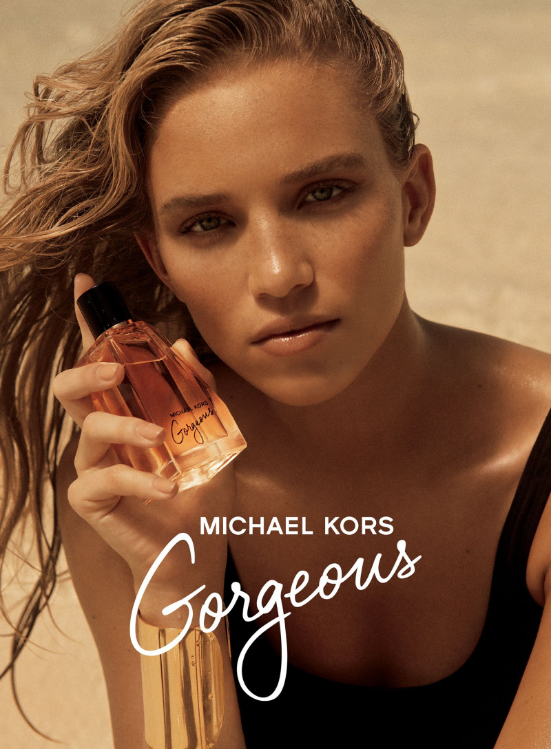 Rebecca Leigh Longendyke featured in  the Michael Kors Beauty Gorgeous Fragrance advertisement for Summer 2022