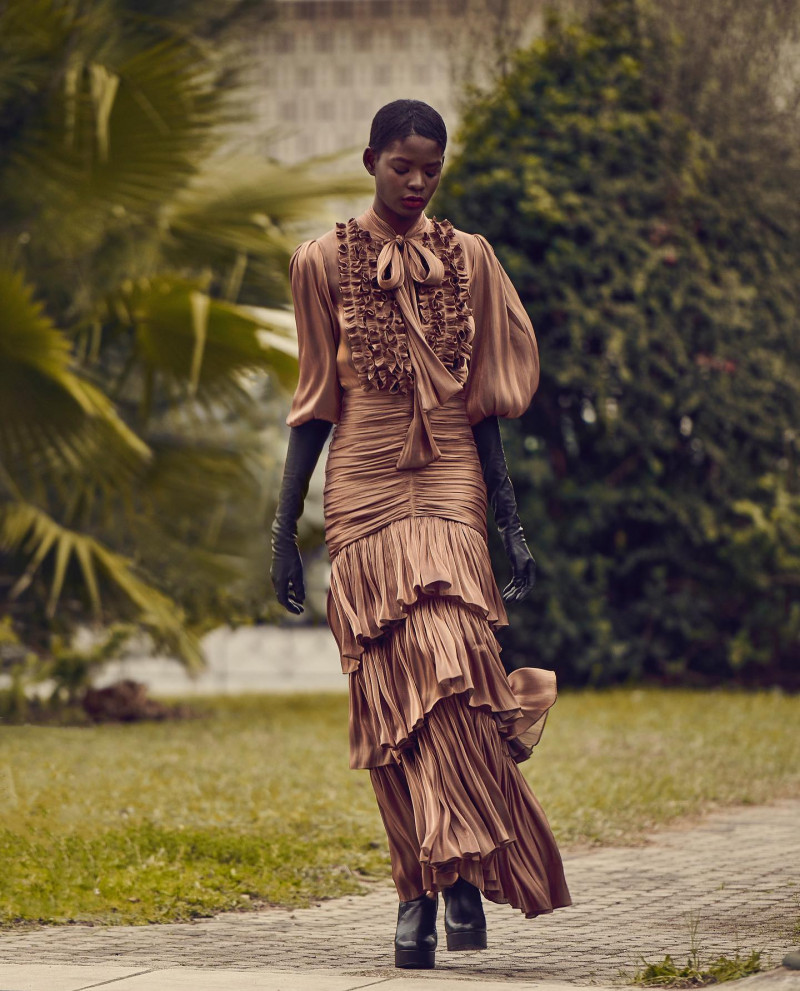 Mouna Fadiga featured in  the Costarellos lookbook for Pre-Fall 2021