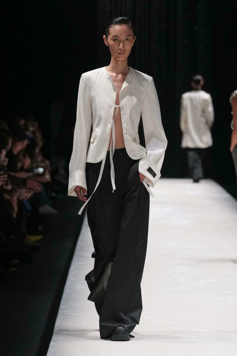 Xiru Yang featured in  the MM6 Maison Martin Margiela fashion show for Spring/Summer 2024